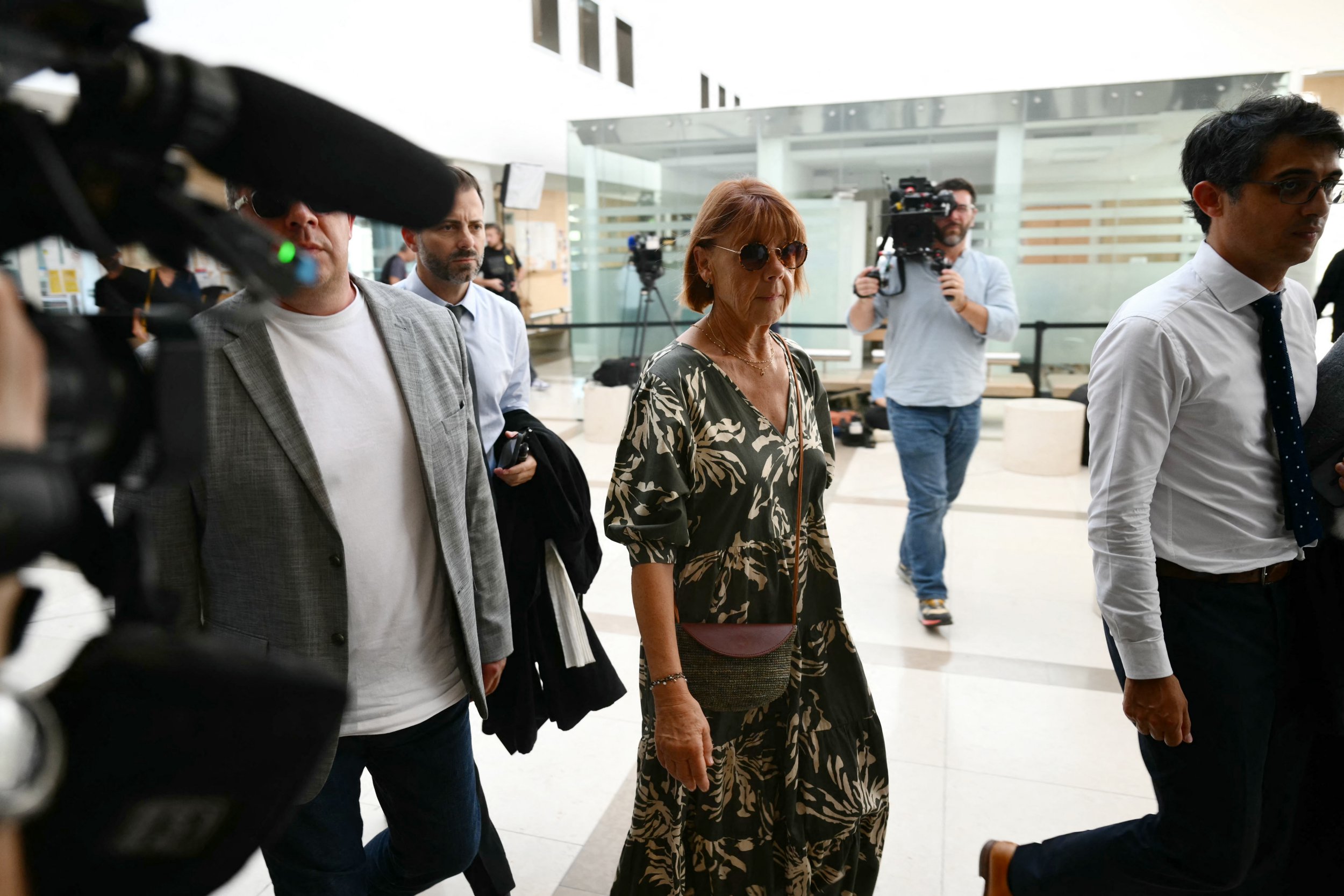 Gisele P. arrives at the courthouse during the trial of her husband accused of drugging her for nearly ten years and inviting strangers to rape her